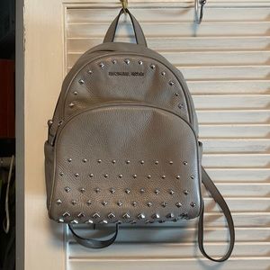 Grey studded Micheal Kors backpack